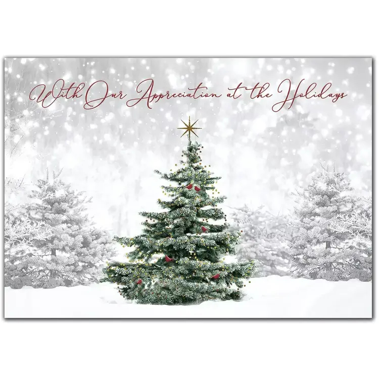Custom holiday cards with single green tree in snowy forest