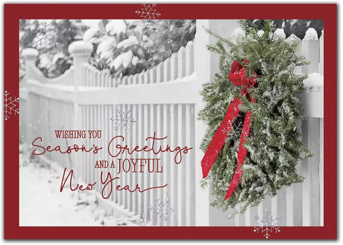 Custom greeting cards with white picket fence and decorated wreath.
