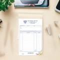 Carbonless sales books with custom text at bottom