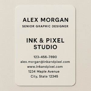 Custom business cards with round corners printed on natural white paper in black ink