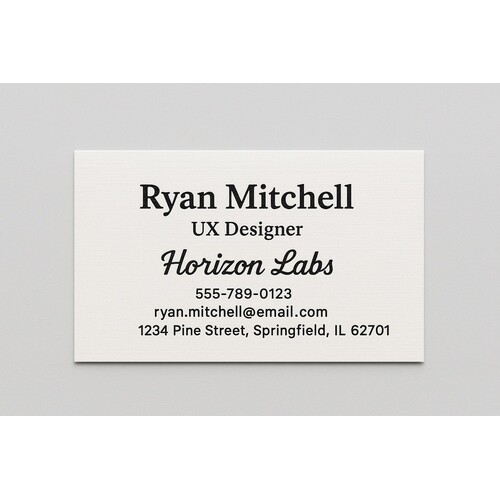 Custom linen business cards printed with raised ink (black only) on the front side