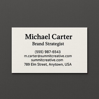 Custom natural white linen business cards printed with raised ink (black only) on the front side