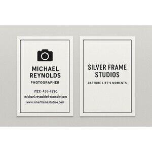 Custom business cards printed on heavy card stock with raised ink (black only) on both sides