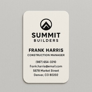 Custom business cards printed on premium natural white paper with raised black ink
