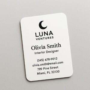 Custom business cards printed on Strathmore paper with raised ink (black only)