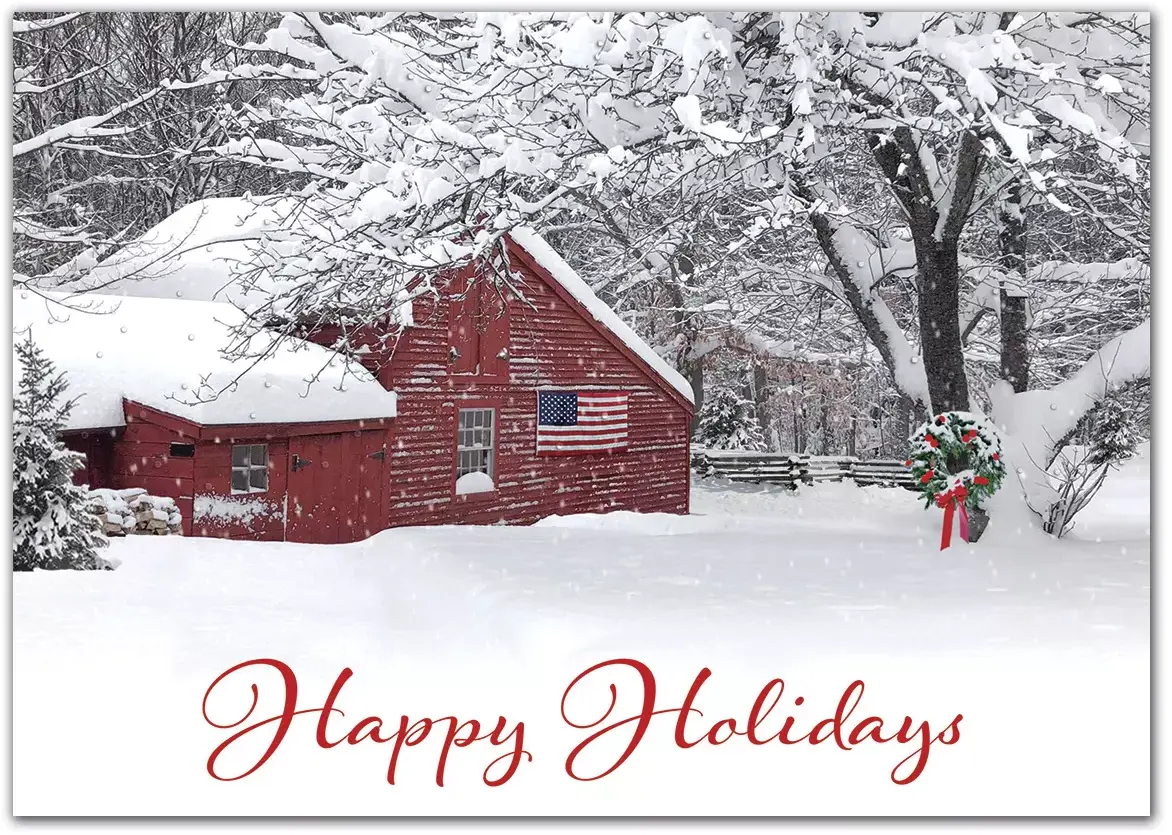 Custom printed holiday cards with an American flag on a snowy countryside barn