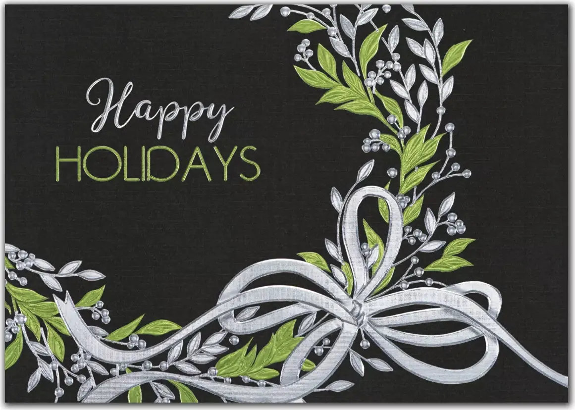 Custom printed holiday cards with a green wreath and silver accents on a black background