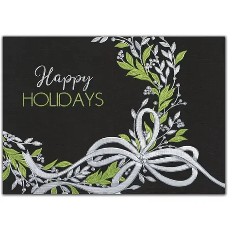 Custom printed holiday cards with a green wreath and silver accents on a black background