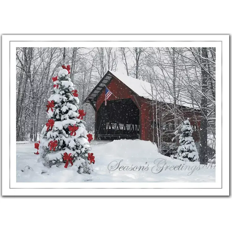 A custom printed business greeting card featuring a decorated outdoor Christmas tree 