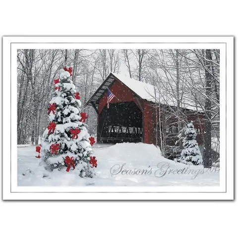 A custom printed business greeting card featuring a decorated outdoor Christmas tree 