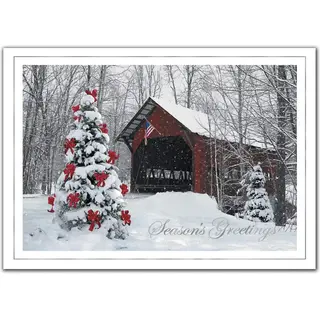 A custom printed business greeting card featuring a decorated outdoor Christmas tree 