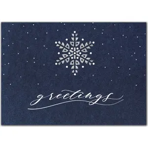 Elegant custom navy blue holiday card with a single white snowflake and "greetings" text for corporate use.