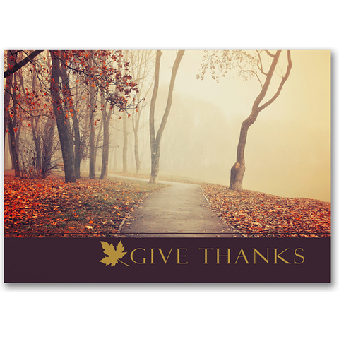 Thanksgiving card featuring a misty autumn park path with colorful fall leaves