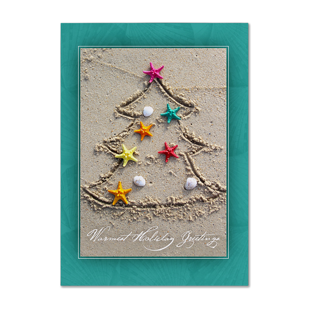 Warm holiday greetings card featuring a Christmas tree drawn in sand with colorful starfish and seashells