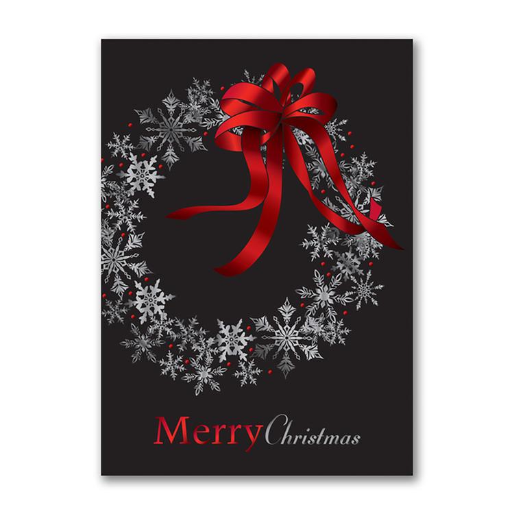Merry Christmas card featuring a snowflake wreath with a red ribbon bow on a black background