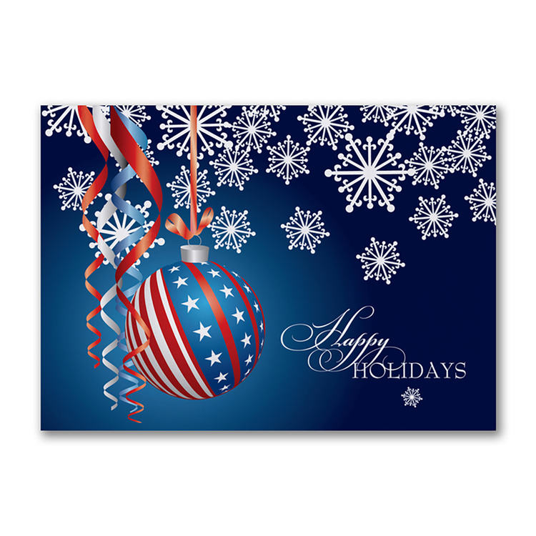 Happy Holidays card featuring a patriotic red white and blue ornament with snowflakes and festive ribbons