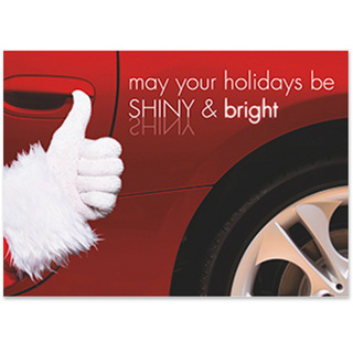 Custom automotive holiday card featuring a Santa thumbs-up beside a red car with the message "May Your Holidays Be Shiny & Bright"