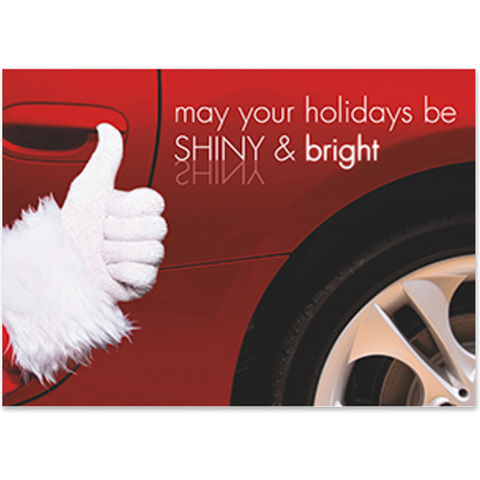 Custom automotive holiday card featuring a Santa thumbs-up beside a red car with the message "May Your Holidays Be Shiny & Bright"