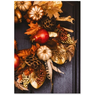Elegant autumn harvest wreath featuring pumpkins, gourds, berries, and fall foliage on a dark wooden door