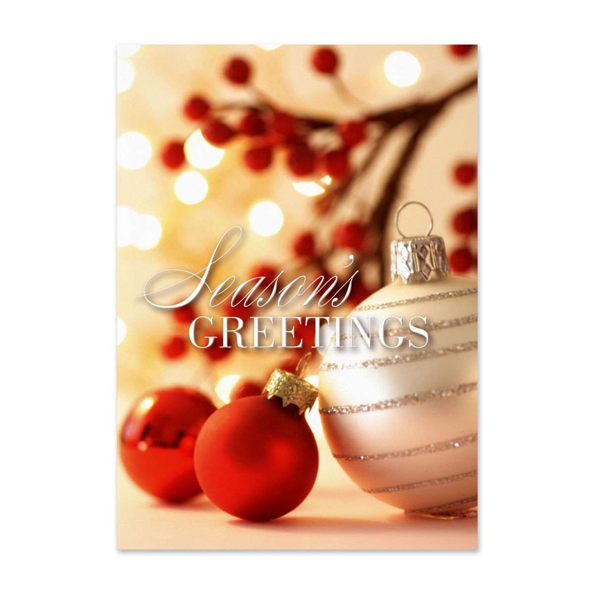 Elegant holiday greeting card featuring red and silver Christmas ornaments with warm glowing lights and festive berries