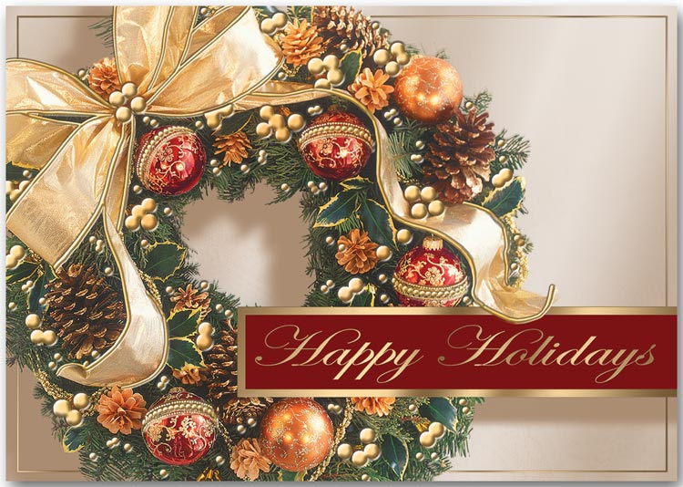 Holiday greeting cards featuring a wreath with a gold bow and pinecones.