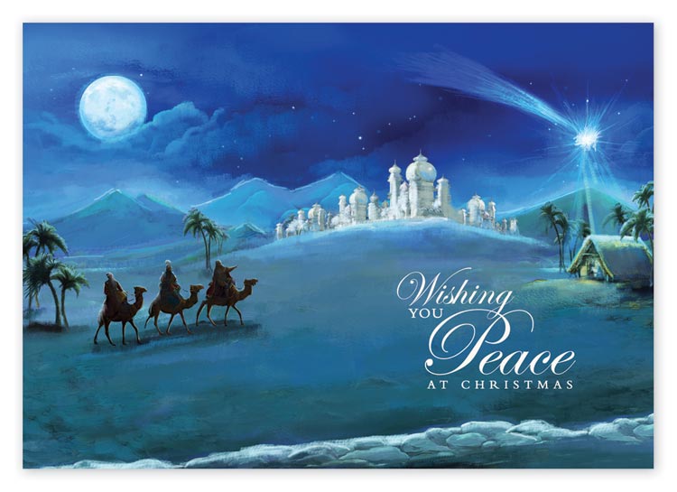 Custom printed Christmas card with a peace message on a blue background.
